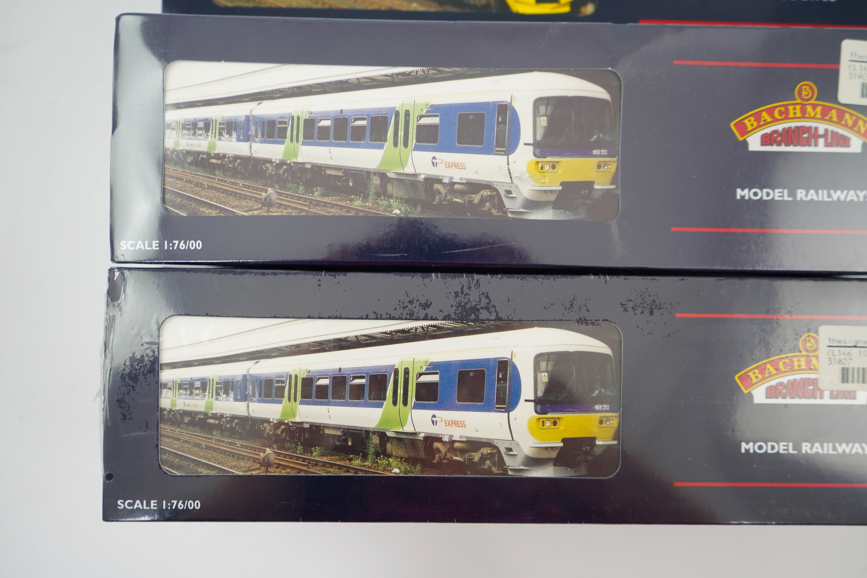 Three Bachmann Branchline 00 gauge railway DMU sets; 166 Turbo 3-car DMU, Thames Trains (31-026), 166 Turbo 3-car DMU, First Great Western/Link (31-027) and 158 2-car DMU, Wales and West (31-506)